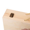 A vintage wooden wine box in light wood, featuring a metallic clasp and golden rope handle.