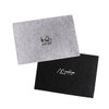 A grey and a black felt file folder, both featuring logos, stacked on top of each other.