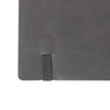 A grey PU cover notebook with a textured finish and an elastic band closure.