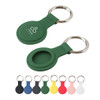 A green silicone Air Tag protective case with a keyring, featuring a logo, alongside other coloured cases.