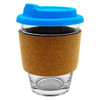 A glass coffee cup with a cork sleeve and a blue plastic lid. It features a logo on the lid.