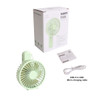 A foldable USB handy fan in light green, accompanied by a USB charging cable and a box with a logo.