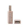 A Wheat Straw USB Data Blocker in a speckled white and pink design, featuring a USB connector and a USB port.