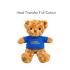 A brown plush bear wearing a blue shirt with a logo, sitting upright. The bear has shiny black eyes.