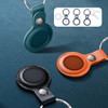 PU leather AirTag holders in teal, black, and orange, each with a keyring and a metallic snap button.