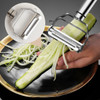 A stainless steel vegetable peeler with a dual function, featuring a sleek design and ergonomic handle.