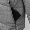 A grey puffer jacket displaying a smartphone tucked into its zippered pocket. The jacket has a sleek, modern design.