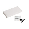 A white box containing a USB cable and a manual for a bamboo wireless power bank.