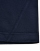A navy polo shirt featuring a contrasting sleeve and collar design, with visible stitching details.