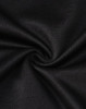 A close-up of black sustainable poly/cotton fabric, showcasing a smooth and sleek texture.