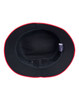A black bucket hat with a red contrast brim and interior. The hat features a label inside.