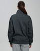 A dark grey 1/2 zip collar polar fleece jumper with a relaxed fit and a plain back. Features a branding logo.
