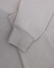 A light grey polar fleece jumper featuring a half zip collar and fitted cuffs. It has a subtle logo.