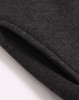 A close-up of a dark grey 1/2 zip collar fleecy jumper, showing the soft texture and stitching details.