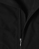 A black softshell vest featuring a zip closure and a textured interior. The vest includes a logo.