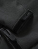 A close-up of grey softshell fabric featuring black fasteners and cuffs on a full zip hoodie. It includes a branding logo.