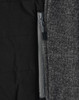A grey heather fabric with a quilted black interior and a zippered pocket detail. The jacket has a sleek design.