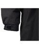 A close-up of the cuff of a black Long Line Stadium Jacket featuring adjustable fastenings.