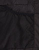 A black parka jacket featuring a textured inner pocket and smooth exterior materials. Includes a logo.