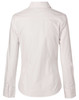 A women's long-sleeve button-up shirt in a light colour, featuring a fitted design and a back yoke. It has a logo.