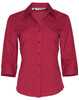 A red 3/4 sleeve shirt with a collar and buttons, featuring a logo on the label.