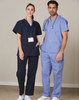 Unisex scrub pants in navy blue, worn by a male and female model, featuring a logo on the garment.