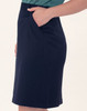A navy utility cargo skirt with side pockets, featuring a tailored fit and sleek design. It has a subtle logo.