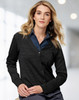 A long-sleeved women's cardigan made of 100% Merino wool in dark grey, featuring a button-up front and a v-neckline.
