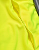A close-up of a bright yellow vented fabric from a polo shirt, featuring a grey stripe. The material has a textured appearance.