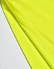 A close-up of a bright yellow polo shirt showing the fabric texture and stitching details.