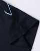 A navy blue polo shirt featuring short sleeves and contrasting stitching. It has a logo on the chest area.