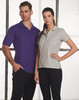 A man in a purple polo shirt and a woman in a grey polo shirt, both with collars, standing side by side.