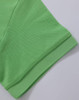 A vibrant green Ladies' Truedry Pique Polo showcasing the sleeve and hem details. Features a logo.
