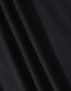 A close-up of black fabric showcasing the texture of a polo shirt. The material appears smooth and lightweight.