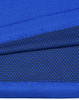 A close-up of blue bamboo charcoal fabric with textured patterns and a visible logo.