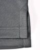 A grey sustainable poly/cotton polo shirt featuring detailed stitching and a side vent design.