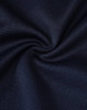 A close-up of navy fabric, showcasing a smooth texture with a slight sheen, ideal for shirts.