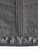 A grey quilted safety jacket with orange stitching, featuring a zip closure and a lining for added warmth.