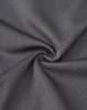 A close-up of dark grey, textured fabric showcasing a breathable mesh design, suitable for work polo shirts.