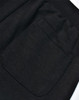 A close-up view of a black poly/cotton terry sweat pant, highlighting a back pocket detail.