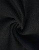 A close-up of black poly/cotton fabric, featuring a soft and smooth texture suitable for sweat pants.