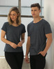 A women's and men's short-sleeve T-shirt in cool heather grey, featuring a logo on the shirt.