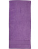 A purple terry velour beach towel measuring 75x150 cm, featuring a plain design with a logo.