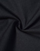 A close-up of black rip-stop poly/cotton fabric, showcasing its textured weave and durable quality.