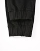 Cuffed work pants in black cotton stretch drill fabric, featuring a comfortable, fitted design.