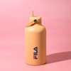 A drink bottle in a soft orange colour with a screw-top lid and a logo on the front.