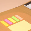 A padfolio featuring a brown exterior, with assorted sticky notes in pink, yellow, green, and orange.