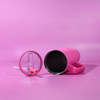 A pink 1.2L tumbler with a removable lid and straw, set against a pink background. It features a handle and a logo.