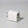 A white 20W fast charge adapter with two ports and a logo, suitable for travel.