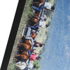 A counter mat featuring a vibrant image of horses and riders working on a ranch, with earthy tones and a scenic background.